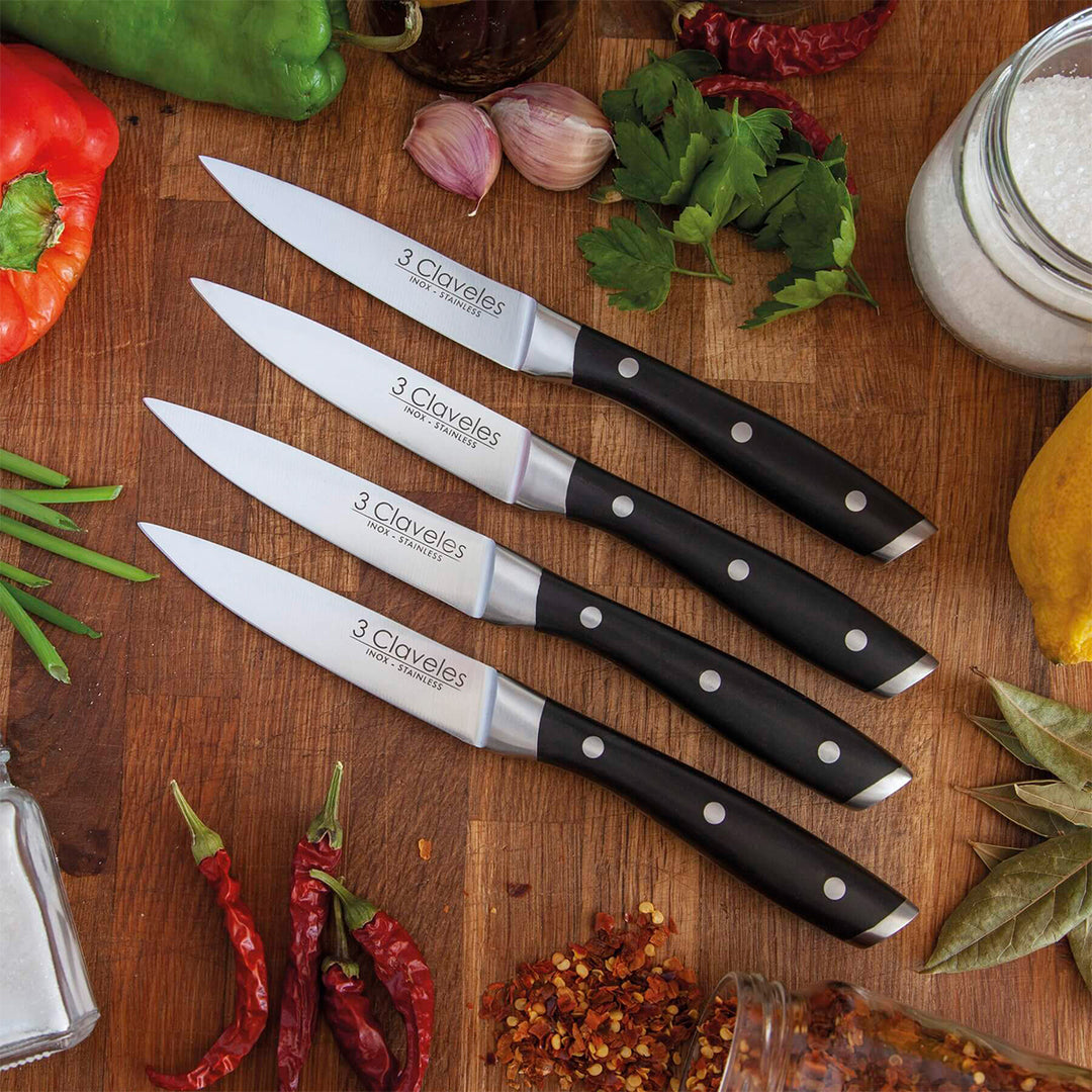 3 Claveles - Set de 4 Cuchillos Chuleteros Profesionales 11.5 cm Acero Inoxidable Mango ABS
